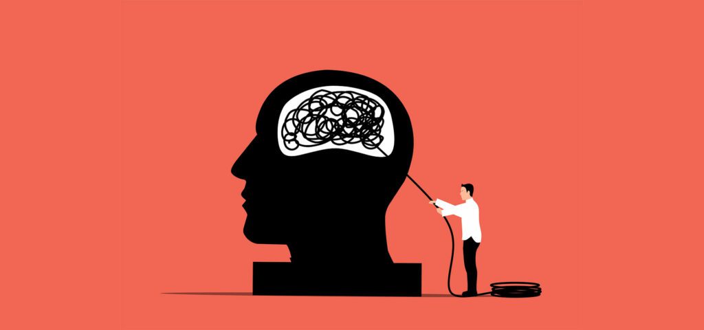 illustrazione digitiale con una testa e un cervello con pensieri aggrovigliati e un uomo all'esterno della testa che li scioglie